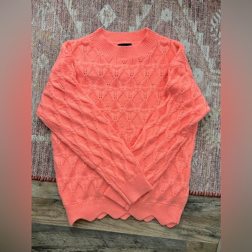 Bright coral sweater size medium.